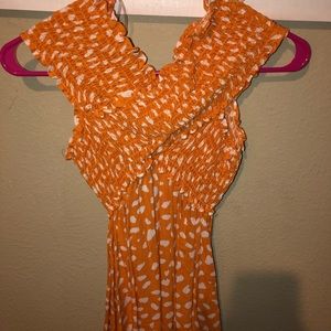 Cute orange and white top!